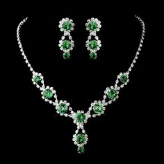 Dazzling%20Emerald%20Green%20Jewelry%26nbsp%3B%0D%0AThis%20elegant%20jewelry%20set%20includes%20a%20gorgeous%20necklace%20with%20matching%20earrings%20featuring%20sparkling%20emerald%20Green%20crystals%20and%20clear%20rhinestones.%20The%20rhinestone%20encrusted%20silver%20chain%20catches%20the%20emerald%20green%20crystals%20and%20gracefully%20drapes%20each%20gem%20with%20a%20delicate%20elegance%20culminating%20in%20a%20subtle%20pendant%20hanging%20with%20two%20emerald%20green%20crystals.%0D%0ASize%3A%20Earrings%20are%201.25'%20long.%20Necklace%20is%2013.5%22%20Long%20with%20a%204.25%22%20extender.%0D%0AColor%3A%20Silver%2FEmerald%20Green.%0D%0AStyle%3A%204362Gset1.%0D%0APrice%20includes%20gift%20box.%0D%0APlease%20allow%201%20week%20for%20delivery.%0D%0AShipping%20Policy.%0D%0AReturn%20Pol Quinceanera Necklace, Green Quinceanera, Emerald Green Jewelry, Collar Verde, Quinceanera Jewelry, Emerald Green Necklace, Blue Diamond Engagement Ring, Formal Jewelry, White Gold Diamond Engagement Ring