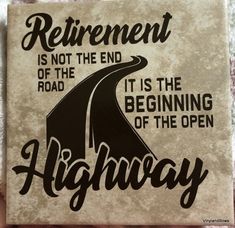 a sign that says retirement is not the end of the road it is the beginning of the open highway