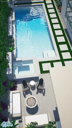 an aerial view of a pool and patio area