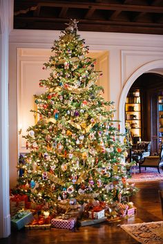 a decorated christmas tree in a living room