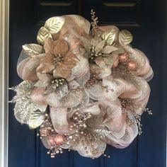 a wreath is hanging on the front door