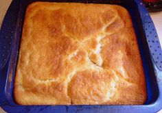 a blue casserole dish filled with bread