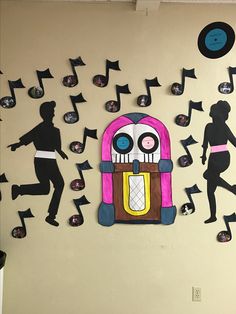 there is a wall decoration with musical notes on it