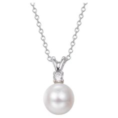 This classic understated pearl pendant, is perfect for a bride. A beautiful 8mm pearl is perfectly suspended below a delicate claw set round brilliant cut. Composed of 925 sterling silver with a high gloss white rhodium finish. Compliment with our matching Lydia Pearl Stud Earrings. Whether you're looking for a classic piece to add to your jewellery box, or something totally on-trend, designers Lustre of London believe that every woman should have the chance of owning exquisite designer jewelry, for that extra sparkle and glamour. Lustre of London’s versatile day and night collections represent traditional and contemporary designs of earrings, rings necklaces etc that will make heads turn. Breath-takingly flawless and inspiring jewelry with a blend of semi-precious gemstones and diamond si Classic Pearl Necklace With Diamond Accents For Anniversary, Classic Round Brilliant Cut Pearl Necklace, Classic Pearl Necklace With Cubic Zirconia, Elegant White Solitaire Necklace, Pearl Jewelry With Prong Setting, Classic Pearl Necklace With Diamond Accents, Classic Pearl Necklace With Diamond And Pearl Charm, Classic Diamond Pearl Necklace With Pearl Charm, Classic Pearl Pendant Jewelry With Cubic Zirconia