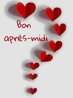 some red hearts with the words bon appre - midii written in them on white paper