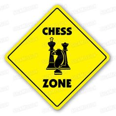 a yellow sign that says chess zone with a black and white chess figure on it