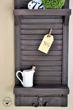 shutter with shelves and decorations Diy Projects With Wood, Projects With Wood, Shutter Shelf, Recycled Decor, Rustic Shutters