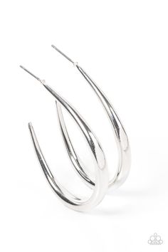 three silver hoop earrings on a white background