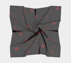 A silk scarf is the epitome of luxury when it comes to accessories. Whether you're dressing to the nines or simply adding an elevated touch, this 100% silk charmeuse scarf is sure to have you covered. Featuring red florals on a black background, the colors are vibrant and permanent, and each scarf is made to order and hand sewn for that added bit of luxury. Tie back your hair while out for lunch or wrap it like a shawl when you're out for dinner. However you use it, the silk charmeuse scarf will Red Satin Scarves As Gifts, Flowers Dark Aesthetic, Flowers Dark, Dressed To The Nines, Black Thread, Silk Charmeuse, Soft Hands, Silk Scarves, Dark Aesthetic