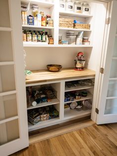 the pantry is stocked with all kinds of food