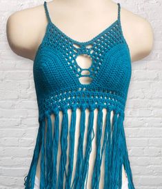 Crochet fringe halter bikini top. Made with soft 100% cotton Ties in the back in a corset style criss-cross and around the neck, making it adjustable to fit different sizes. Want padding added? Add this listing to your order and choose from either push up or regular foam padding. https://www.etsy.com/listing/399021473/add-padding-to-your-crochet-top Summer Fringe Halter Top, Summer Beach Halter Top With Fringe, Cotton Triangle Top Swimwear For Festivals, Fitted Tassel Tops For Beach, Fitted Tassel Tops For The Beach, Fitted Crochet Top For Festival Beachwear, Fitted Crop Top For Beach Festivals, Bohemian Beach Crop Top With Fringe, Fitted Fringe Swimwear For Festivals