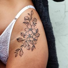 a woman's stomach with flowers on it