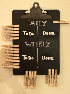 a bulletin board with clothes pins attached to it that says daily to do, weekly to do