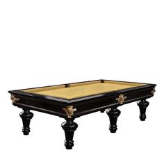 an antique pool table with black legs and gold trimmings on the top,