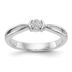 a white gold ring with a diamond in the center