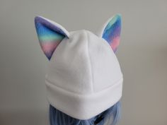 "This handmade fleece hat with cat ears is great for cold days, cosplay, or just for fun! The ears are designed to remain standing even when moving around. The base color of the hat is white with customizable ear colors. Sizing: Kid - 20\" Big Kid/Adult Small - 21\" Adult Medium - 22\" Adult Large - 23\" For best fit, measure head circumference just above eyebrows, at the largest part of the head. If you need a size that is not listed please message me and I would be happy to make it to size! Si Cheap Hats With Cat Design, Novelty Cat Ears Costume Hats For Winter, Winter Costume Hats And Headpieces With Cat Ears, Cute Cat-ear Hat With Cat Design, Cute Cat Ears Hat With Cat Design, Cute Cat-eared Hat With Cat Design, Cute Cat Design Hats With Cat Ears, Hat With Cat Ears, Ear Beanie