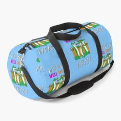 a blue duffle bag with an image of a beach scene on it