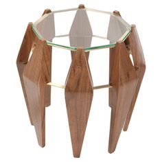 a glass and wood table with geometric shapes