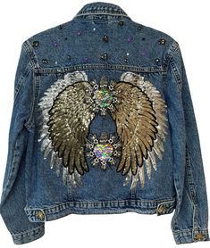 🌟 Embrace Your Unique Style with the Denim Jacket with Silver Wing! 🧥 Step into the world of individuality with our Denim Jacket featuring captivating silver sequin angel wing embroidery. This vintage-inspired denim jacket is more than just fashion; it's an expression of your distinct style. 🦢 Captivating Silver Sequin Wing: Embrace the charm of the captivating silver sequin angel wing embroidery on this denim jacket. The sequins add a touch of glamor and individuality to your attire. 🌟 Unique Fashion Essence: Stand out effortlessly with a jacket that's as unique as you are. The Denim Jacket with Silver Wing is more than just fashion; it's an expression of your distinct style. 🧥 Versatile Denim: Denim jackets are celebrated for their timeless versatility. Pair this jacket with jeans, Wing Embroidery, Denim Jacket Vintage, Upcycle Clothes Diy, Middle Age Fashion, Clothes Diy, Silver Wings, Womens Jackets, Vintage Denim Jacket, Marc Fisher