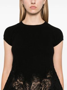 This luxurious top is the perfect blend of comfort and elegance, effortlessly elevating any outfit with its chic design. Crafted from a unique mix of cashmere and wool, it boasts beautiful embroidered details that add a touch of sophistication. Whether you're dressing up for a night out or keeping it casual, the scallop hem provides a stylish finish that's both timeless and trendy. Black cashmere ribbed knit Corded-lace trim Crew neck with cap sleeves Unlined for lightweight comfort Scallop hem Wool T Shirt, Lace Trim Top, Scallop Hem, Embroidered Wool, Corded Lace, Trim Top, Ermanno Scervino, Knitwear Cardigan, Short Tops