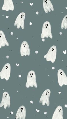 a pattern with white ghost faces and hearts on a gray background for fabric or wallpaper