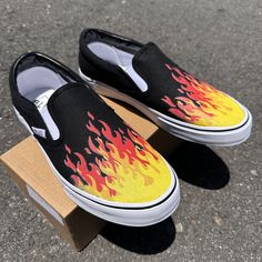 These custom BLVD Slip On Shoes have been customized with Flames.  These shoes have canvas uppers.  Vulcanized waffle rubber outsoles. For Men and Women. Designed by Blake Barash.  We buy each pair of shoes BRAND NEW. Each pair is made to order, please make sure you put in the correct shoe size before you check out. The ink is permanent and will never come off, fade away, or peel off. Made in the USA. This price includes everything: shoes, artwork, and shipping. Thanks for stopping by our Etsy shop! Please message me with any questions! Looking for a size you don't see available? Checkout our Vans listing: https://bit.ly/44eXJp6 Please know your size before ordering. Sizes listed are in US sizing scale. Please note that colors of actual item may slightly differ from what you see on your sc Custom Slip-on Skateboarding Sneakers With Rubber Sole, Custom Slip-on Sneakers For Skateboarding, Slip-on Custom Sneakers With Vulcanized Sole For Streetwear, Slip-on Canvas Shoes With Rubber Toe Cap For Streetwear, White Slip-on Canvas Shoes With Rubber Toe Cap, Skateboarding Canvas Shoes With Rubber Toe Cap, Yellow Canvas Shoes With Vulcanized Sole, Canvas Slip-on Sneakers With Gum Sole For Streetwear, Slip-on Canvas Shoes With Vulcanized Sole For Streetwear