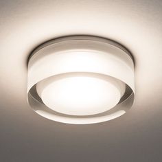 a close up of a light fixture on a ceiling