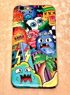 an iphone case with cartoon characters painted on it