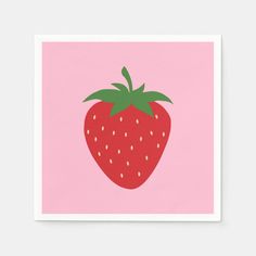 a strawberry on a pink background