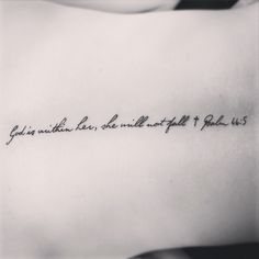 a black and white photo of a person's arm with a quote on it