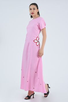 Experience effortless grace in our Maxi Shift Cotton Dress adorned with delicate floral embroidery. Formal Maxi Dress With Floral Applique, Formal Floral Applique Maxi Dress, Feminine Floral Embroidered Maxi Dress For Evening, Feminine Floral Embroidery Maxi Dress For Evening, Feminine Floral Embroidered Evening Maxi Dress, Evening Maxi Dress With Floral Embroidery, Fitted Floral Applique Floor-length Dress, Fitted Floor-length Dress With Floral Applique, Feminine Floral Embellished Floor-length Dress