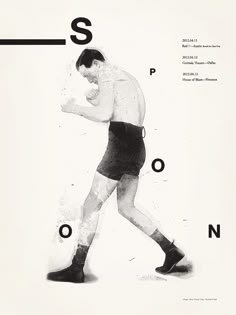 a black and white photo of a man wearing boxing shorts with the letter s on it