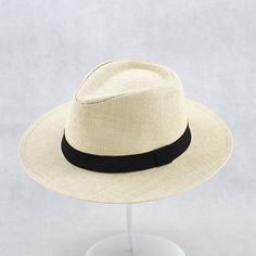 The Panama hat is not only a fashion but also a fine handmade artwork. Lightweight, breathable, and shading make it the darling of summer trends. Authentic Quality Genuinely handmade by master weavers directly!Excellent Sun Protection With a UPF 50+ rating, these hats provide the perfect amount of shade during sunny weather! One Size Fits Most Fedora hat circumference:23.2",wide brim:2.65",one size fits most man women lady girl. Elegant and Stylish The ideal accessory to add extra fashion into a White Artisan Handmade Panama Hat, White Panama Hat With Upf 50+, Adjustable White Panama Hat With Upf 50+, Adjustable Fedora-style Summer Panama Hat, Fedora Panama Hat With Uv Protection, One Size, Church Activities, Mua Sắm, Central African, Cute Hats