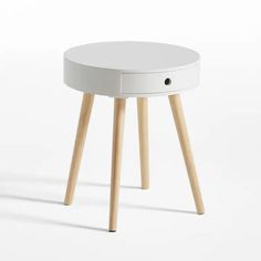 a small white table with wooden legs on a white background, showing the top portion of the table