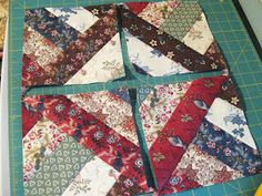 the quilts are laid out on the cutting board