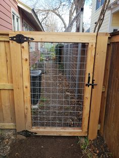 a gate that is made out of wood and wire