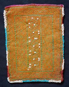 This is a beautiful Pashtun silk embroidered pouch in a wonderful green hue from the Paktia province, Afghanistan.  It is surrounded by blue glass beads.  The workmanship is of very high quality and hand done.  -Natural colors-High quality workmanship Traditional Green Beaded Bag, Traditional Green Beaded Bags, Embroidered Pouch, Face Photo, Silk Embroidery, Natural Colors, Embroidered Silk, Embroidery Art, First Night