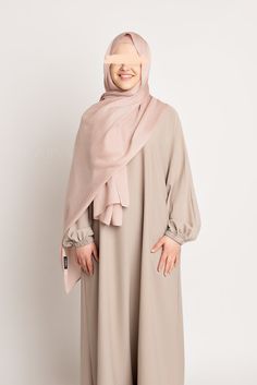 This light muted pink set combines the soft, smooth drape of a modal hijab with the breathable, cooling comfort of a bamboo hijab undercap. Perfect for any occasion, it offers a seamless modest look while ensuring all-day comfort and freshness. Includes: Luxury Modal Hijab - Pale Mauve Bamboo Jersey Hijab Undercap - Pale Mauve Modest Pink Headscarf For Eid, Modest Beige Hijab For Eid, Hijab Undercap, Modal Hijab, Hijab Colors, Jersey Hijab, Bamboo Shades, Muted Pink, Pink Set