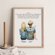 a framed poster with two people sitting next to each other on a white wall, and the text dad you left me beautiful memories