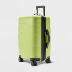 For convenient packing and traveling, pick this Hardside Carry-On Suitcase from Open Story™. Featuring a full zip-around closure, this lime green hardside suitcase is expandable to offer you extra space for additional stuff. The interior features multiple compartments and cross straps plus full lining. Designed with eight wheels, this hardside carry-on suitcase features a retractable handle for easy storage and holds up to 100 pounds. Open Story™: Every journey inspires a new chapter. Story Bags, Cute Suitcases, Men Faces, Best Carry On Luggage, Spinner Suitcase, Metallic Purse, Girly Bags, Carry On Suitcase, Carry On Luggage