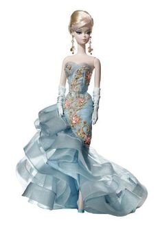 a barbie doll wearing a blue dress with flowers on it's skirt and gloves