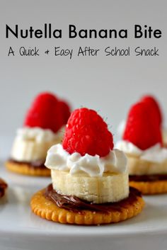 three mini desserts with whipped cream and raspberries on top