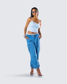 Add a little flare to your closet with these blue denim parachute pants 💙 With a chic yet casual feel, these pants complete with cargo pockets and a smocked waistband are the perfect piece for any occasion where you want to be the best dressed 😚 Trendy Cargo Jeans With Elastic Waistband, Trendy High Rise Parachute Pants With Cargo Pockets, Urban Blue High Waist Cargo Pants, Urban Style Blue High Waist Cargo Pants, Urban High Waist Blue Cargo Pants, Urban Style High Waist Blue Cargo Pants, Spring Denim Cargo Pants With Elastic Waistband, Trendy Blue Cargo Pants With Cargo Pockets, Trendy Blue Cargo Pants With Pockets