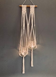 two hanging lights made out of macrame string