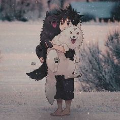 a person holding a dog in the snow