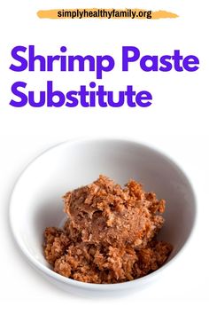 a white bowl filled with food and the words shrimp paste subsite on it