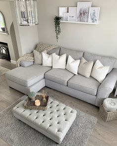 a living room filled with furniture and decor