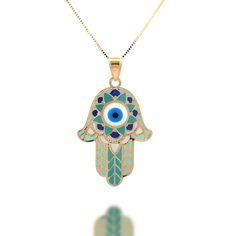 a necklace with an evil eye on it