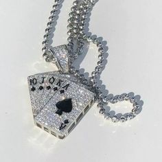 Gorgeous Royal Flush Deck Of Cards Pendant! Solid 925 Sterling Silver Measures Roughly 1" By 1"...Weighs 8 Grams 100 Micropaved Handset Man Made Diamonds (Cz) For A Total Of 1.5ct! Listing Is For One Pendant And Chain, Choose Color At Checkout Comes With A 22” Diamond Cut Moon Ball Chain. Luxury White Gold Necklaces With Rhinestones, Luxury White Gold Necklace With Rhinestones, Luxury Sterling Silver Necklace With Rhinestones, Luxury Bling Necklaces For Anniversary, Luxury Silver Necklace With Rhinestones, Luxury White Gold Necklace With Bling, Luxury White Bling Necklace, Luxury Iced Out Silver Necklace, Luxury Silver Necklace With Bling