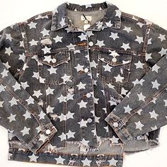 Trendy Grayish Jean Jacket Decorated With Stars And Rips. Casual Star Print Outerwear For Fall, Trendy Winter Outerwear With Star Print, Long Sleeve Star Print Outerwear For Fall, Trendy Long Sleeve Outerwear With Star Print, Casual Outerwear With Star Print For Spring, Casual Spring Outerwear With Star Print, Spring Outerwear With Star Patch And Long Sleeves, Trendy Spring Outerwear With Star Patch, Jean Jackets